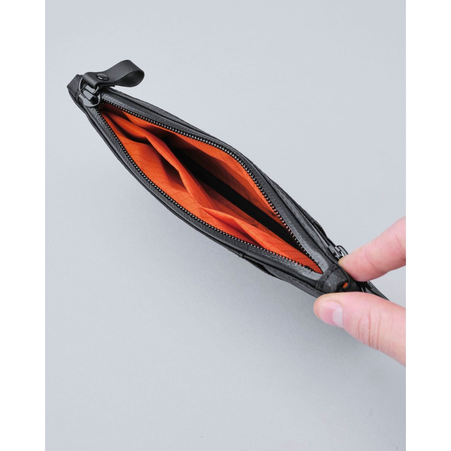 ALPAKA Zip Clutch + Hand Carry Strap