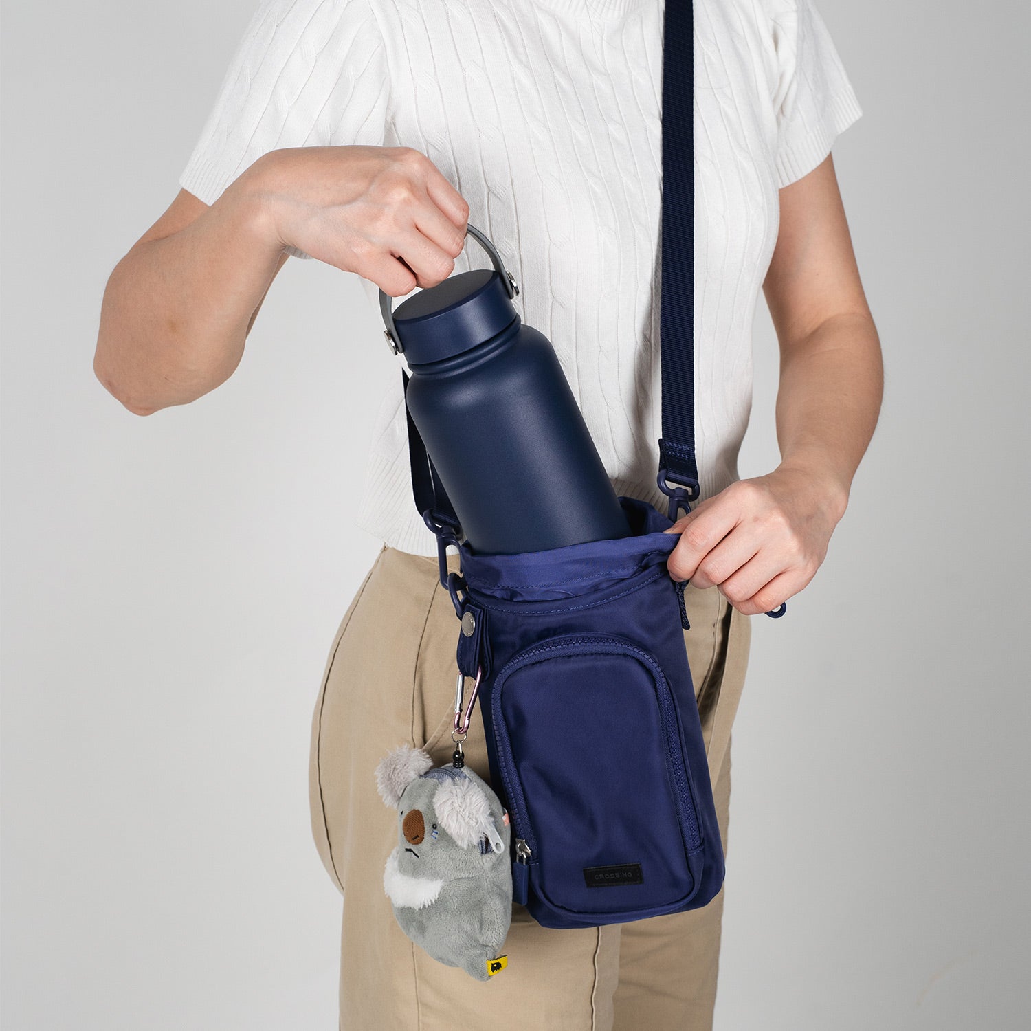 Crossing Water Bottle Crossbody Bag With Front Pocket 2L