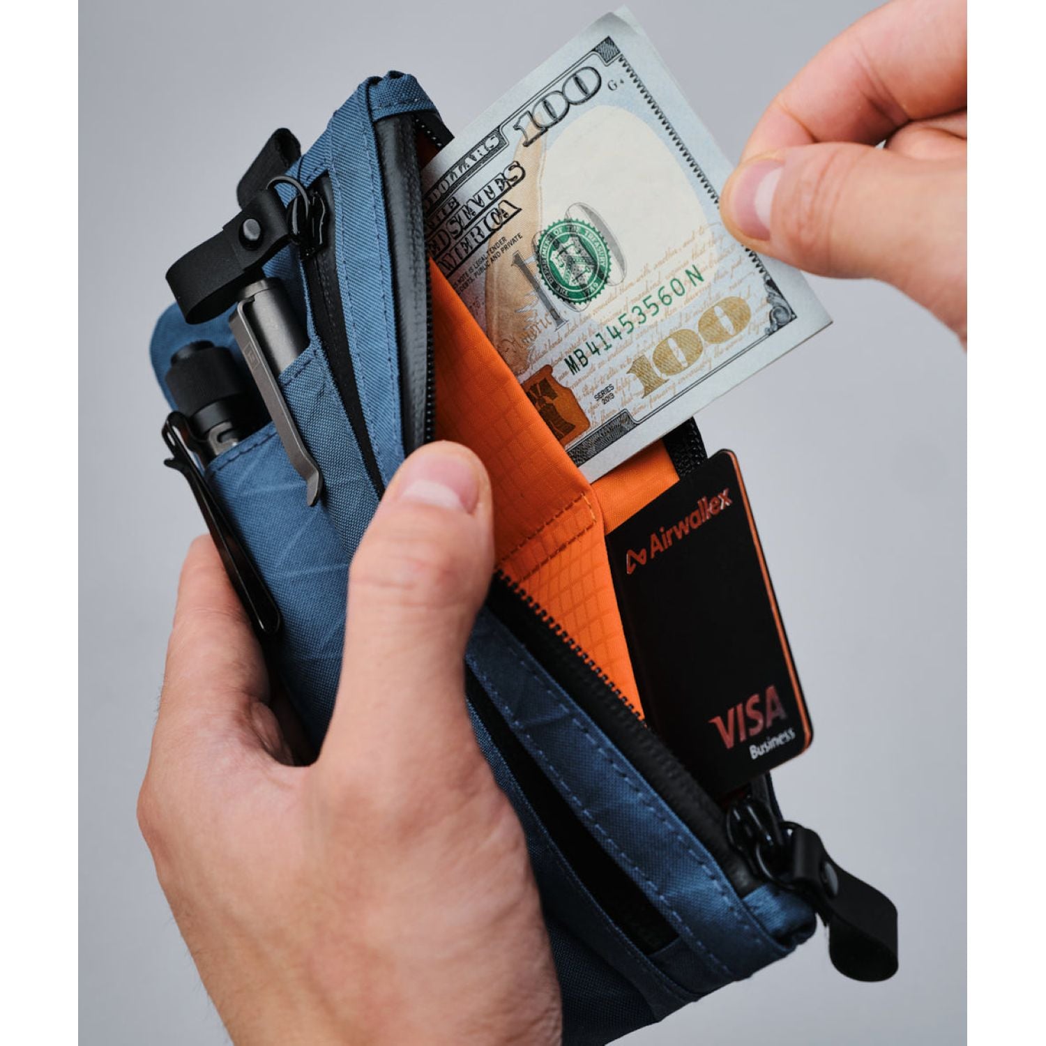 ALPAKA Zip Clutch + Hand Carry Strap